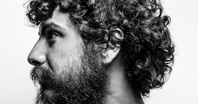 Team using laptops around a table